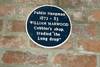 The plaque on William Marwood's shop, 1990. 